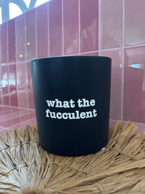 Black pot plant with white text 'what the fucculent'