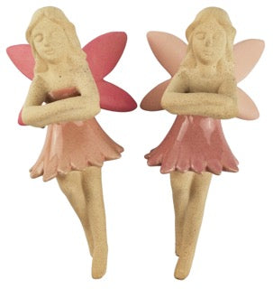 Two fairy figurines with pink wings and dresses that hang on the edge of your pot plant