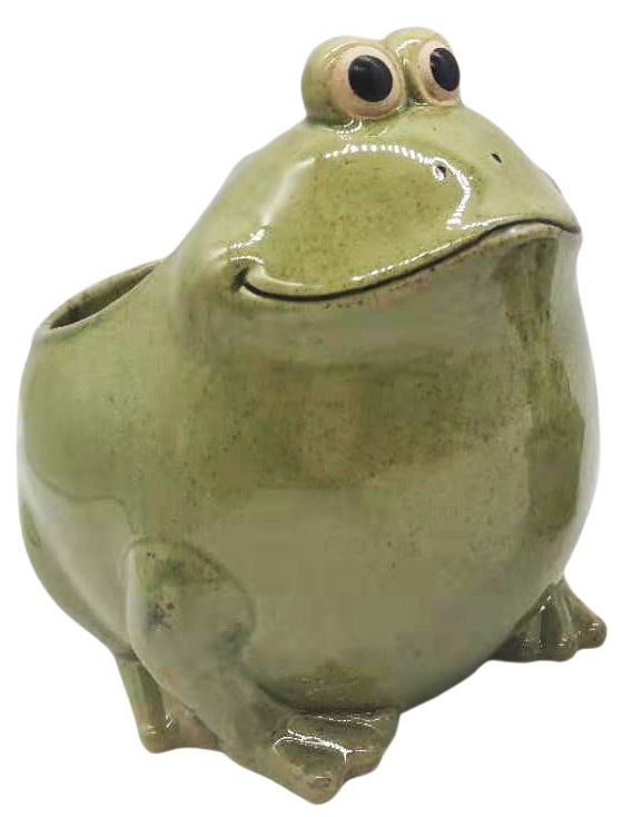 A ceramic planter in the shape of a green frog with a drainage hole on the bottom.