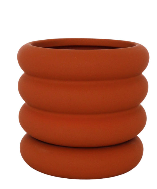 Naomi Ring Planter in orange with matching saucer – fun, sculptural indoor plant pot for stylish home gardens or gifts for plant lovers.