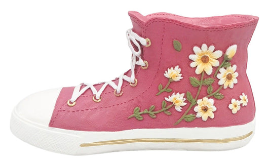 Pink high-top sneaker-shaped planter with floral embroidery on a white background