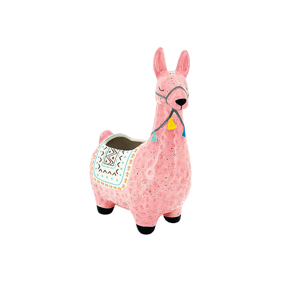Pink llama-shaped planter on a white background