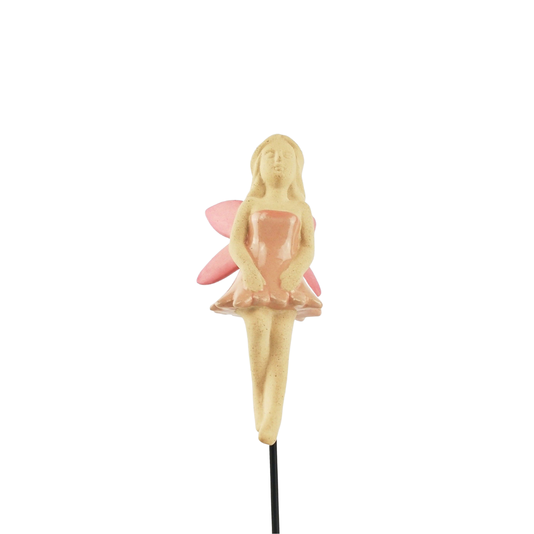Small fairy figurine on a plant stake  with white background