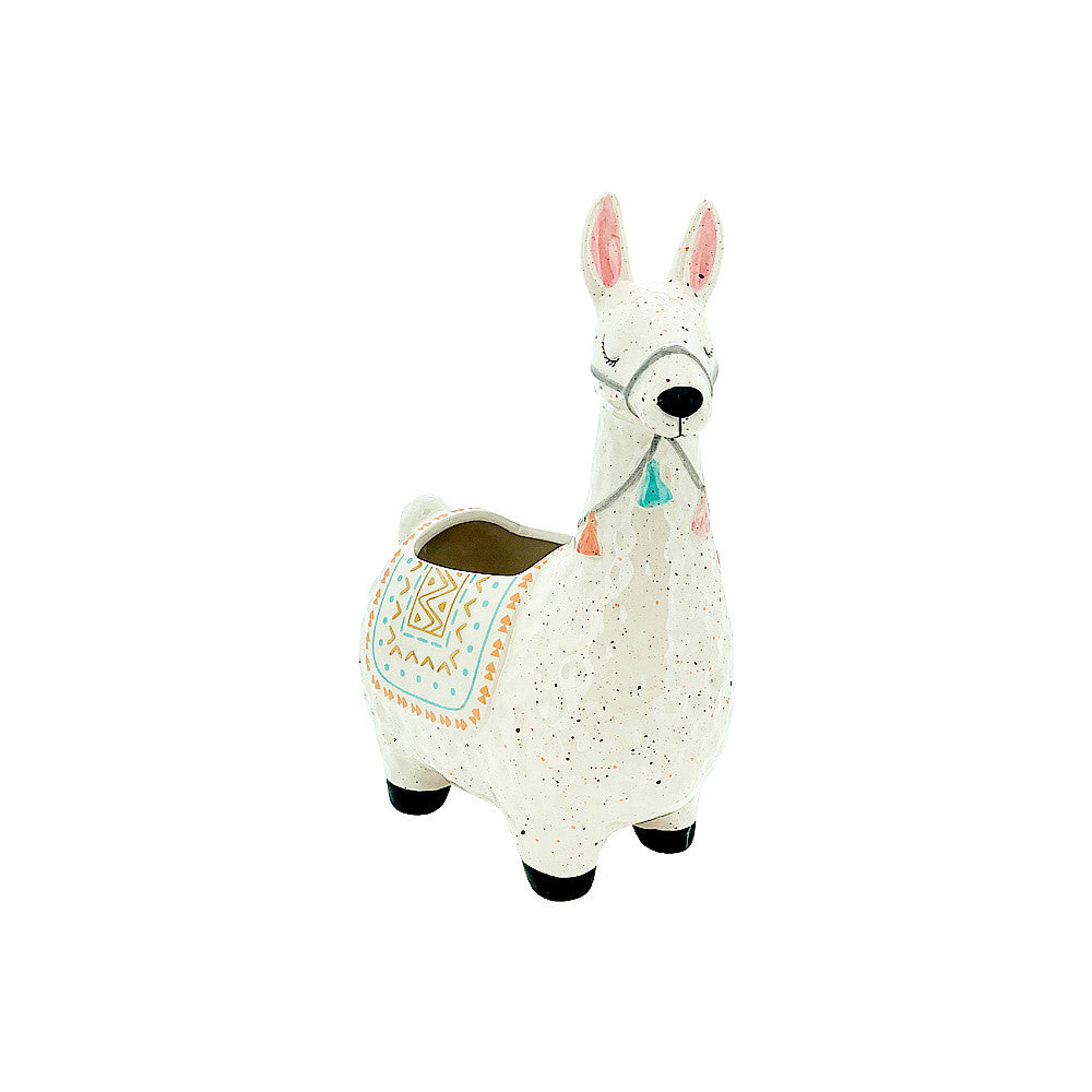 A small ceramic planter in the shape of a white llama with a speckled pattern and colorful details.