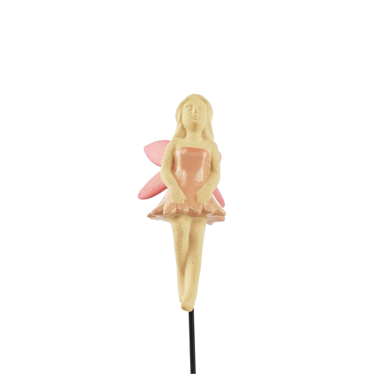 Small fairy figurine on a plant stake  with white background