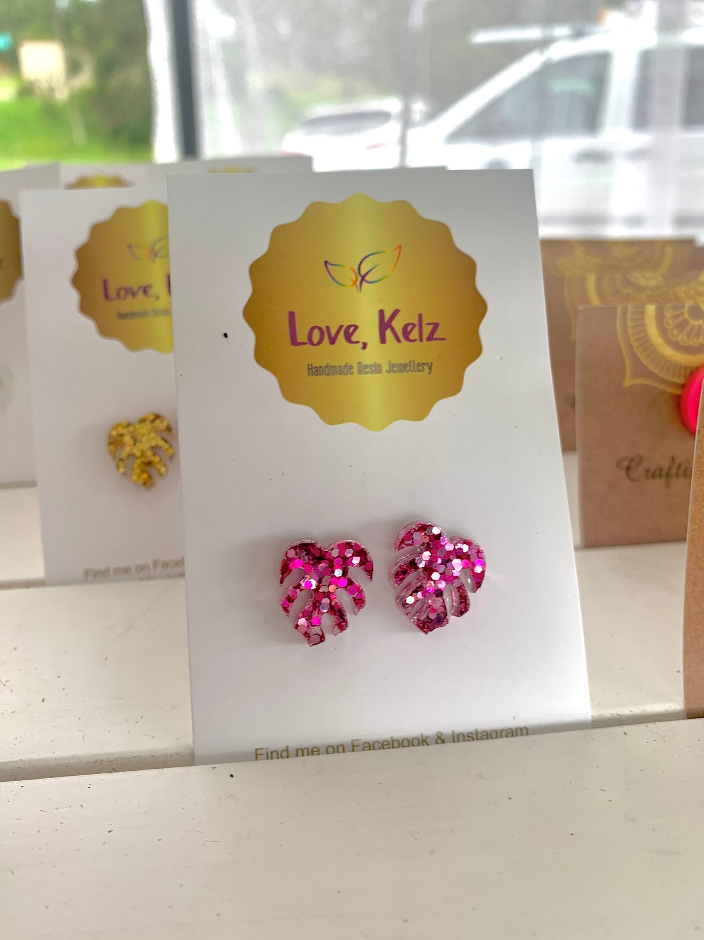 Glitter Mini Monstera Stud Earrings by Love, Kelz